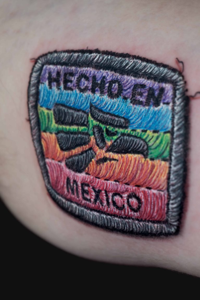 Patch tattoo in Charlotte NC embroidery style with bold colors