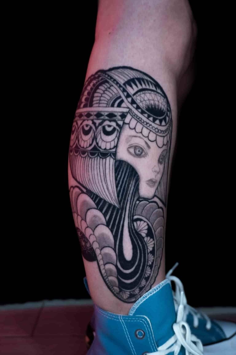 Fine line tattoo of a woman portrait in black and white minimal style