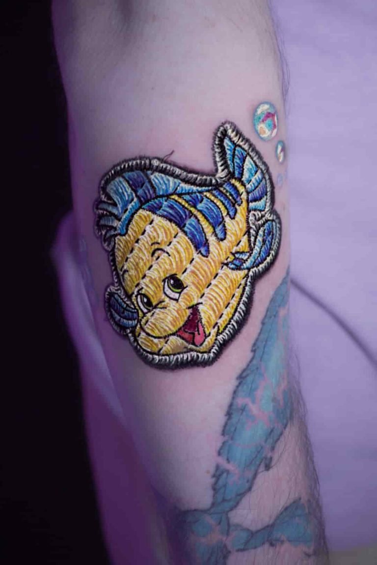 Flounder embroidery tattoo in patch style, colorful Disney Little Mermaid design